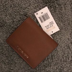 New! Michael Kors Jet Set Travel wallet.